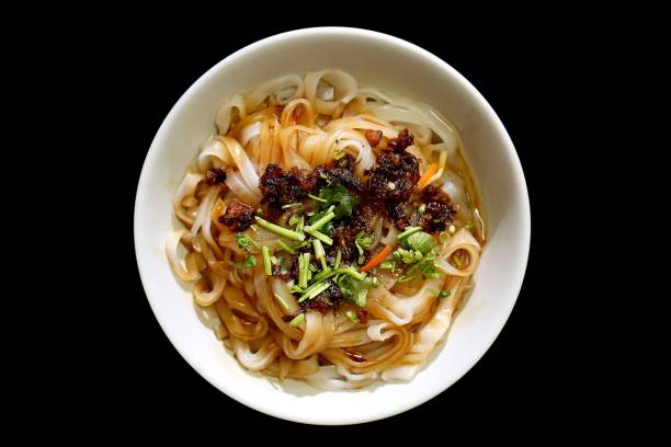 istock Asian noodles with spicy sauce and herbs 2201690755