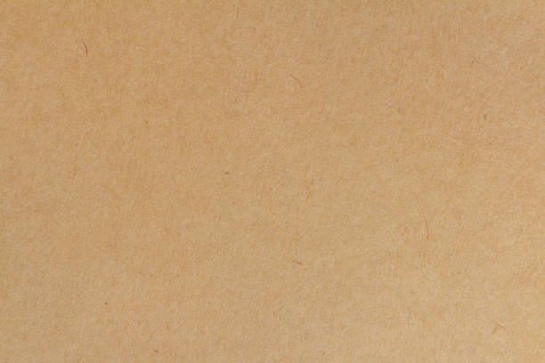 istock Cardboard sheet texture background, pattern of brown kraft paper with vintage style. 2201695192