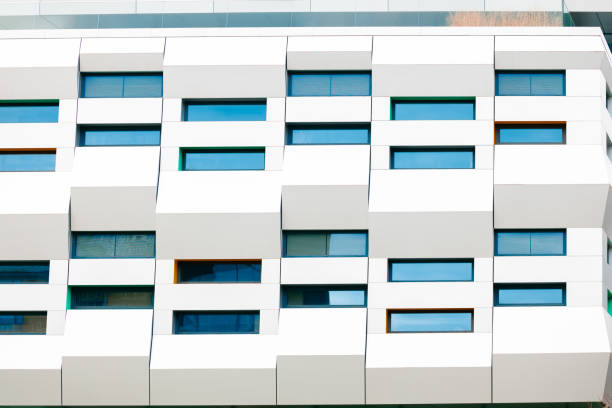 istock Huge facade exterior modern skyscraper office wall white background and cells windows object 2201697579