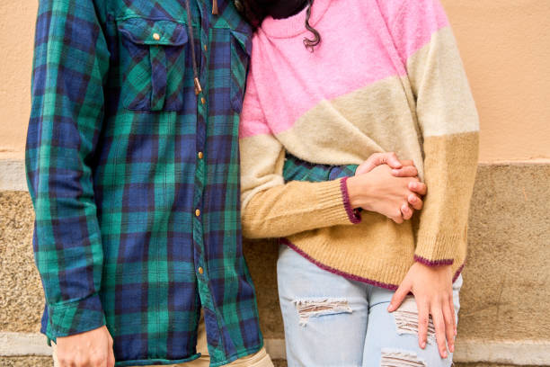 Romantic couple holding hands, expressing their deep love and emotional connection, radiating warmth and togetherness in their relationship