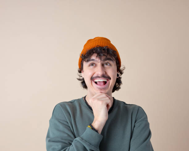 istock Headshot of surprised young man 2201698939