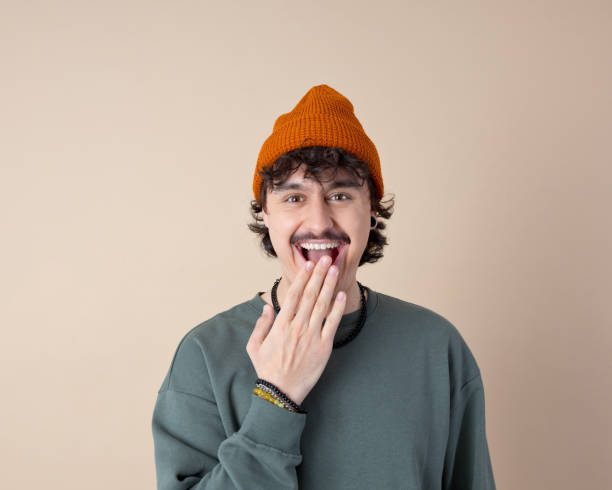 istock Headshot of surprised young man 2201698968