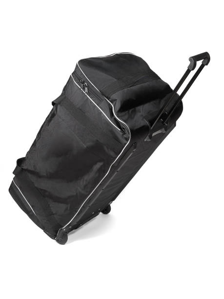 istock A black suitcase equipped with wheels and handles placed on a white background Hockey Equipment Bag 2201699095