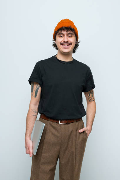 istock Portrait of friendly young man 2201699399