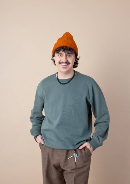 istock Portrait of smiling gen z young man 2201699812