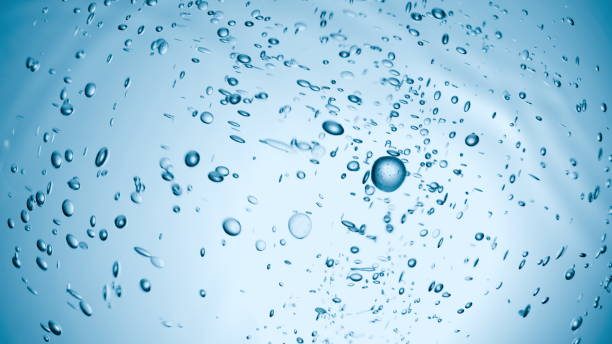 istock Suspended water droplets shimmer in a tranquil setting, creating a mesmerizing display of movement and light, capturing the fluidity of water in a dynamic, serene manner. 3d render 2201700688