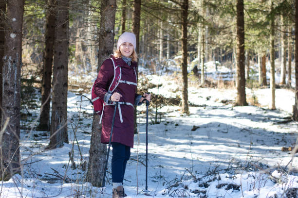 istock Woman hiking on mountains and breathing fresh air 2201701003