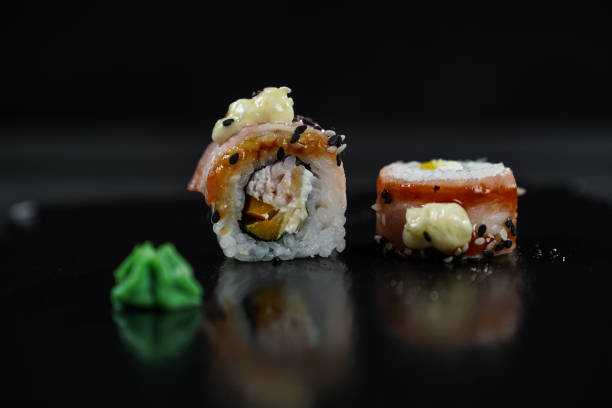 istock menu for a restaurant sushi rolls bacon hot ginger soy sauce wasabi rice serving serving on a black background 2201702859