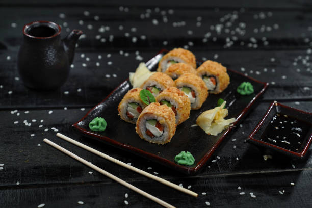 istock menu for a restaurant sushi rolls fried hot ginger soy sauce wasabi rice serving serving on a black background 2201702906