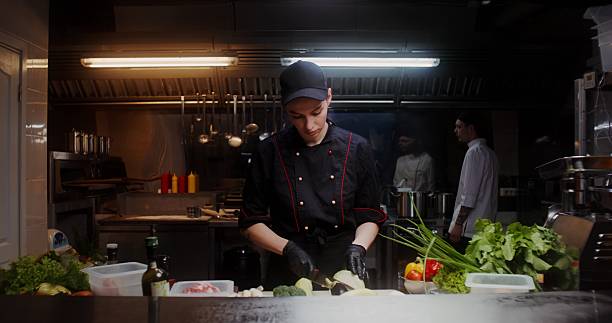 istock A woman in an industrial kitchen 2201704726