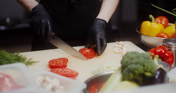 istock A woman in an industrial kitchen 2201704857