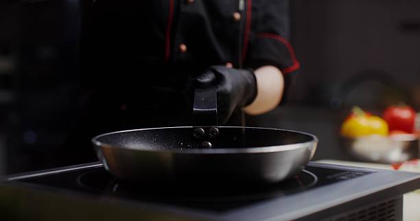 istock A woman in an industrial kitchen 2201704935