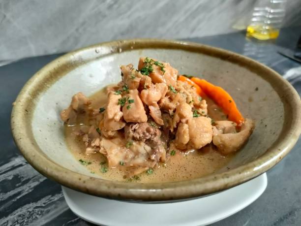 istock a bowl of chicken curry with coconut milk sauce 2201707596