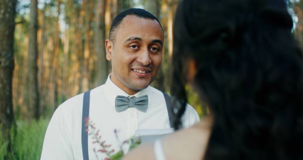 istock African American couple wedding in the forest 2201707792