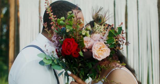 istock African American couple wedding in the forest 2201707854