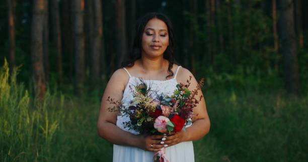 istock African American couple wedding in the forest 2201708827