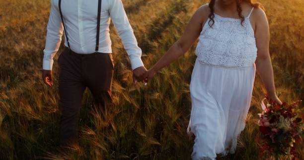 istock African American couple wedding in the forest 2201709702