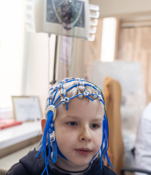 istock A boy's brain is examined on an EEG machine. Electroencephalogram is performed in a hospital laboratory to detect neurological diseases. Encephalogram for children 2201712727