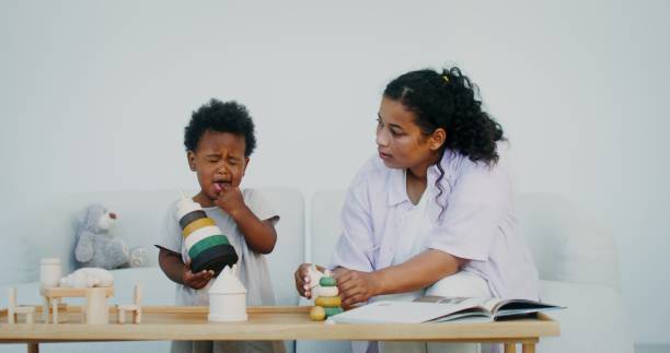 istock Mom and daughter play with toys 2201714248