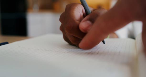istock The girl does her homework at home 2201717259