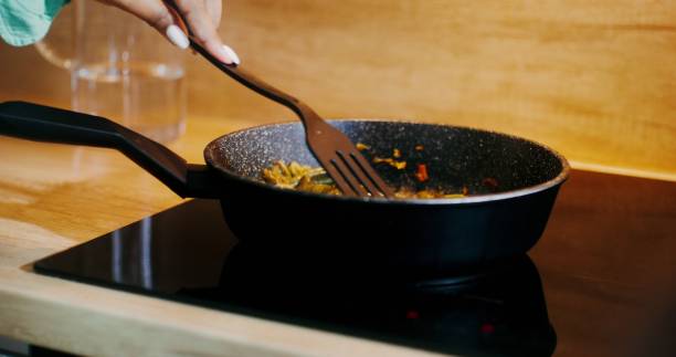 istock Close-up of a frying pan during frying 2201717922