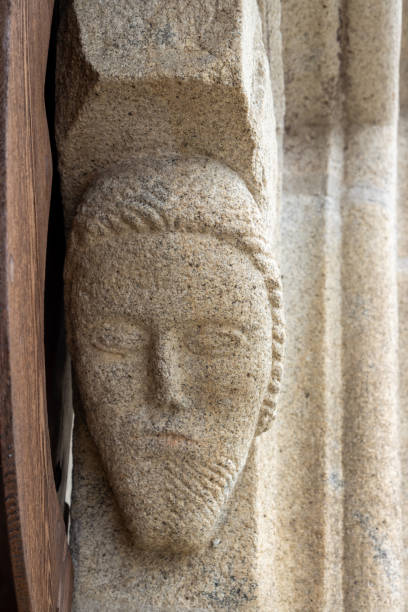 istock Stone head on the portal, Kajov, Czechia 2201725107
