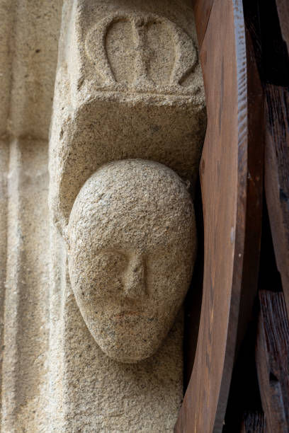 istock Stone head on the portal, Kajov, Czechia 2201725108