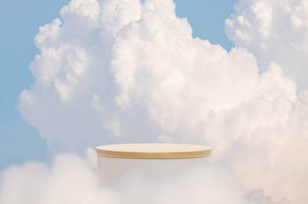 istock Minimal geometry cylinder podium stage with blue sky white fluffy clouds background.product placement pedestal modern stand display,surreal paradise dreamy concept. 2201725158