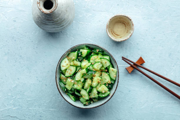 istock Smashed cucumber salad, healthy vegan food, green plant-based appetizer 2201727383