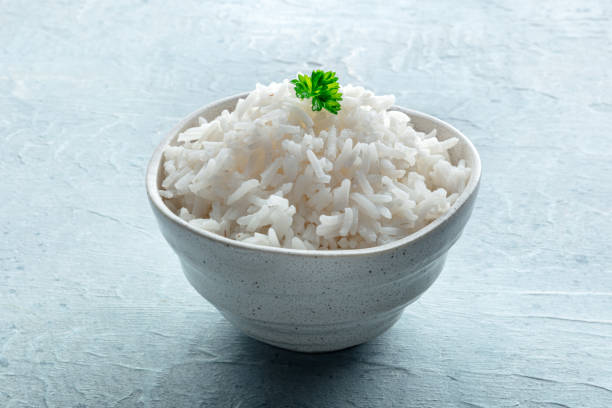 istock White rice, cooked. A bowl of boiled long grain rice, a simple side dish 2201727537