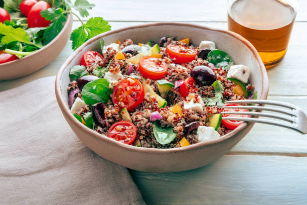 istock Quinoa salad, healthy Mediterranean lunch with fresh organic vegetables 2201727651