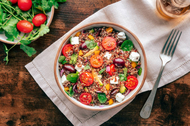 istock Quinoa salad, healthy Mediterranean lunch with fresh organic vegetables 2201727672