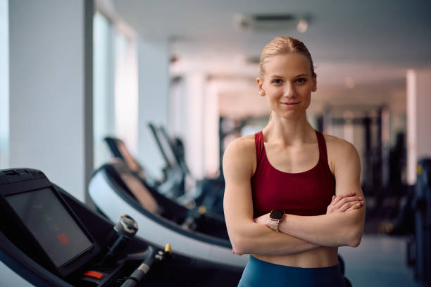 istock Confident sportswoman working out in a gym and looking at camera. 2201729417