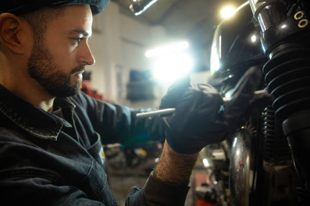 istock Mechanic working on a motorbike -vehicle inspection 2201732137