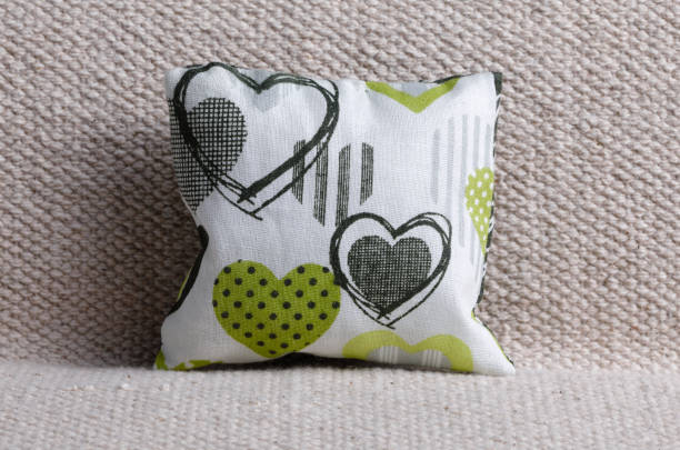 istock Cushion with heart shapes 2201732343