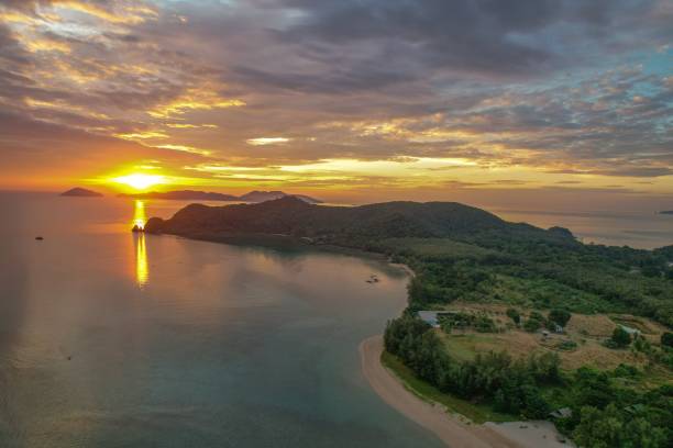 istock Tropical island sunset aerial view 2201733932