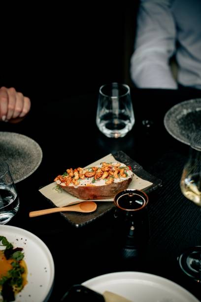 istock Gourmet dish with nuts and herbs in a restaurant. 2201735204