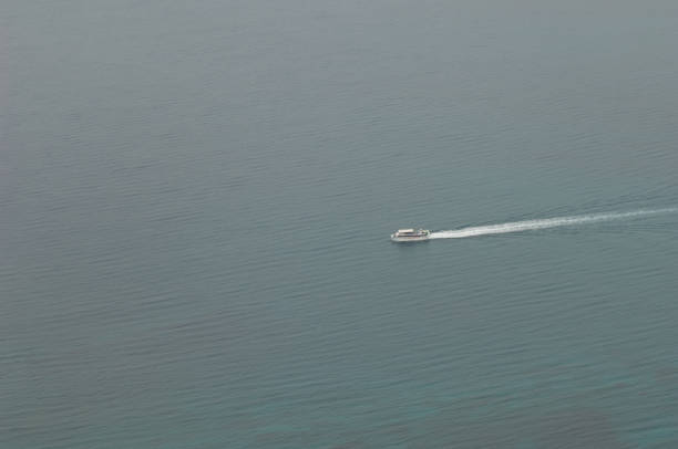 Boat sailing in the north of Lanzarote. El Rio. Haria. Lanzarote. Canary Islands. Spain.