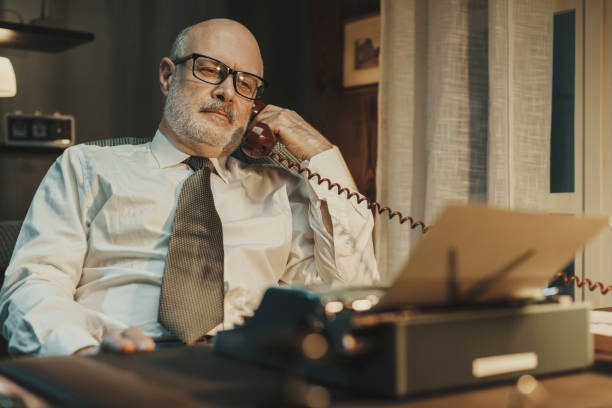 istock Vintage style journalist having a phone call 2201736368