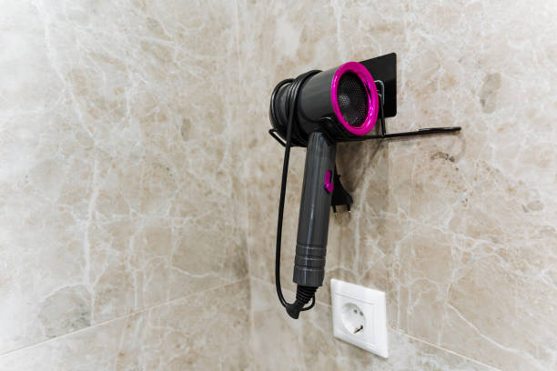 istock Discover the Modern WallMounted Hair Dryer featuring a stylish and contemporary design perfect for any bathroom decor and functionality 2201737892