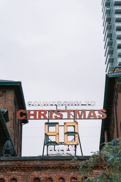 istock A festive Christmas sign situated against an urban backdrop 2201739476