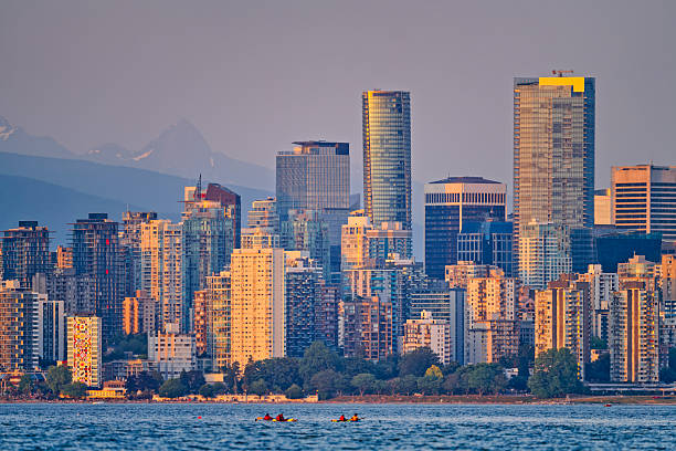 Downtown view of Vancouver and English Bay as seen from the Point Grey area of Vancouver at sunset, British Columbia