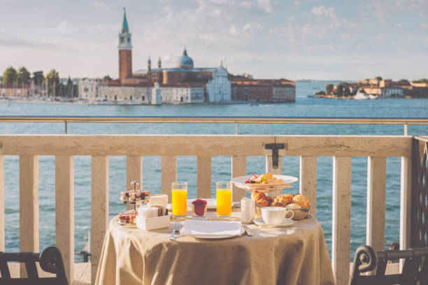 istock Breakfast in the room with lagoon view in Venice 2201749057