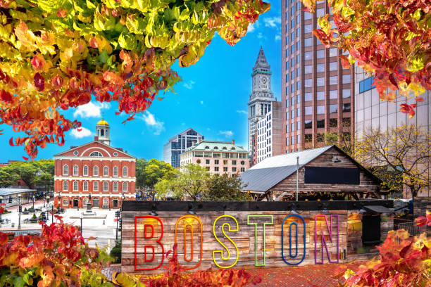 istock Boston Faneuil Hall square and cityscape view through autumn leaves 2201751237