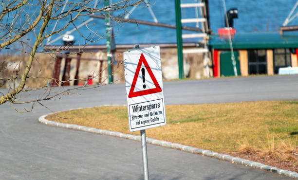 istock winter closure sign on a dry road 2201752955