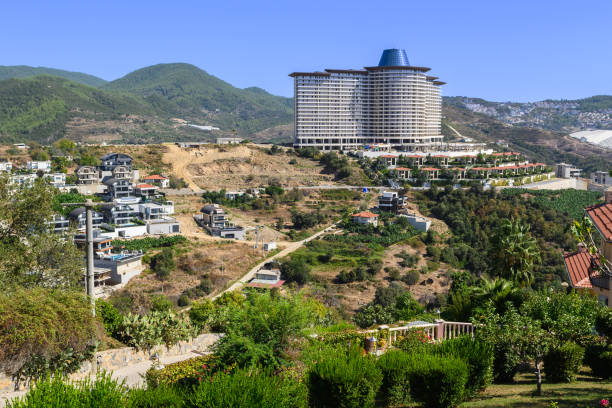 istock Stunning hillside view of a modern resort overlooking lush greenery in a tranquil landscape 2201754443