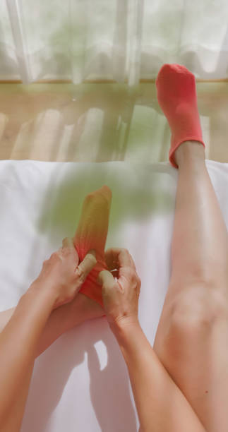 istock woman with itchy feet 2201759384