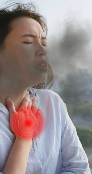 istock woman cover nose against smell 2201759502