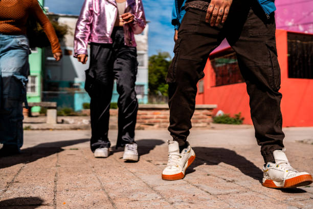 istock Low section of friends dancing outdoors 2201761170