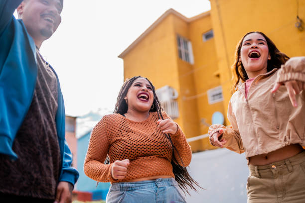istock Young friends talking outdoors 2201761504